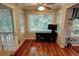 Cozy breakfast nook with hardwood floors, large windows, and views of the surrounding greenery at 36 Saint Claire Ne Ln, Atlanta, GA 30324