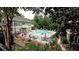 A stunning view of the pool, surrounded by lush greenery at 36 Saint Claire Ne Ln, Atlanta, GA 30324