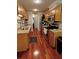 Galley kitchen featuring stainless steel appliances, wooden cabinetry and granite countertops at 36 Saint Claire Ne Ln, Atlanta, GA 30324