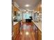 Modern kitchen featuring wood cabinets, stainless steel appliances, and an eat-in breakfast area at 36 Saint Claire Ne Ln, Atlanta, GA 30324