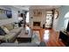 Inviting living room with hardwood floors, comfortable seating, and a cozy fireplace at 36 Saint Claire Ne Ln, Atlanta, GA 30324