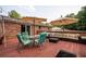 A spacious back deck is furnished with outdoor seating and tables at 3829 Bright Star Road Rd, Douglasville, GA 30135