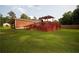A view of a wooden back deck from the large backyard at 3829 Bright Star Road Rd, Douglasville, GA 30135