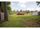 A large backyard with a deck, shed, and wooden fence at 3829 Bright Star Road Rd, Douglasville, GA 30135