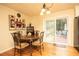 Dining room with hardwood flooring and a patio door overlooking the backyard at 3829 Bright Star Road Rd, Douglasville, GA 30135