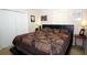 Comfortable bedroom featuring a ceiling fan and natural light at 704 Olde Mill Ln, Norcross, GA 30093
