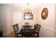 Dining room featuring modern chandelier and table at 704 Olde Mill Ln, Norcross, GA 30093