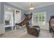 Bonus room with a basketball game and an arcade game, and a neutral chair at 718 First Cotton Dr, Powder Springs, GA 30127