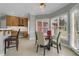 Cozy breakfast nook with large windows, built in desk, and views of the backyard at 718 First Cotton Dr, Powder Springs, GA 30127