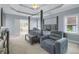 Spacious bedroom with tray ceiling, sitting area and lots of light at 718 First Cotton Dr, Powder Springs, GA 30127