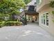 Spacious backyard with a covered patio and a two level deck, perfect for outdoor entertaining at 9745 Autry Falls Dr, Alpharetta, GA 30022
