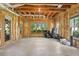 Unfinished basement offering a blank canvas to customize, complete with exposed framing at 9745 Autry Falls Dr, Alpharetta, GA 30022