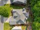 Aerial shot of roof and backyard featuring mature trees and well-maintained landscape at 1290 Magnolia Park Cir, Cumming, GA 30040