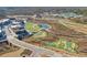 Picturesque aerial view of the community with lush landscaping and walking paths at 1290 Magnolia Park Cir, Cumming, GA 30040