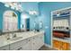 Bright bathroom with double vanity, tub and separate shower leading to bedroom at 1290 Magnolia Park Cir, Cumming, GA 30040
