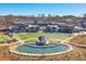 View of an outdoor venue with an amphitheater surrounded by businesses in the community at 1290 Magnolia Park Cir, Cumming, GA 30040