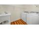 Laundry room featuring a utility sink, washer, and dryer at 1290 Magnolia Park Cir, Cumming, GA 30040