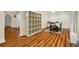 Spacious living area with wood floors, classic furnishings, and neutral decor at 1290 Magnolia Park Cir, Cumming, GA 30040