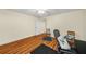 Room with a desk and chairs, wood floor at 1290 Magnolia Park Cir, Cumming, GA 30040