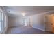 Neutral bedroom features large windows, soft carpet, and easy access to a walk-in closet at 154 Bluffington Way, Marietta, GA 30066