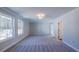 Bright bedroom with large windows, neutral walls, and soft carpeting at 154 Bluffington Way, Marietta, GA 30066