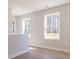 Upstairs hallway with natural light and wood flooring at 154 Bluffington Way, Marietta, GA 30066