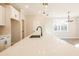 Kitchen island featuring a sink, hardwood floors and lots of natural light at 154 Bluffington Way, Marietta, GA 30066