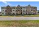 Row of attractive new townhouses featuring coordinated architectural styles and landscaping at 1956 Deco Dr, Kennesaw, GA 30144