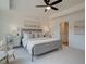 The main bedroom includes carpeted floors, and natural light from the windows at 1956 Deco Dr, Kennesaw, GA 30144