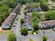 Aerial view of a neighborhood featuring well-maintained townhomes and lush landscaping at 6554 Arbor Gate Sw Dr # 4, Mableton, GA 30126