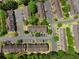 Birds eye view of multiple townhomes with dedicated parking, surrounded by lush greenery and landscaping at 6554 Arbor Gate Sw Dr # 4, Mableton, GA 30126