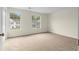 Bright, carpeted bedroom with two windows offering natural light and views at 6554 Arbor Gate Sw Dr # 4, Mableton, GA 30126