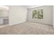 Bedroom with carpet flooring and natural light streaming through the window at 6554 Arbor Gate Sw Dr # 4, Mableton, GA 30126