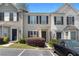 Attractive townhome featuring a well-maintained front yard and convenient parking at 6554 Arbor Gate Sw Dr # 4, Mableton, GA 30126