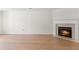 Bright living room boasts hardwood floors and a cozy fireplace at 6554 Arbor Gate Sw Dr # 4, Mableton, GA 30126