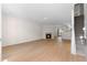 Bright living room boasts a fireplace, hardwood floors, and an open concept design at 6554 Arbor Gate Sw Dr # 4, Mableton, GA 30126