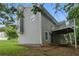 Exterior home elevation with a deck on the side, siding and stone foundation at 11020 Knotty Pine Pl, Hampton, GA 30228