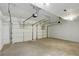 Large two-car garage with automatic door openers at 11020 Knotty Pine Pl, Hampton, GA 30228