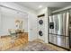 Bright kitchen area adjacent to the dining room featuring stainless steel appliances at 1592 Braeburn Se Dr, Atlanta, GA 30316