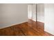 An empty bedroom with hardwood floors, closet, and fresh paint, ready for personalization at 2855 Monticello Pl, Decatur, GA 30030