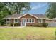 Charming brick home featuring a well-manicured lawn and inviting curb appeal at 2855 Monticello Pl, Decatur, GA 30030