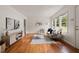 Bright living room with hardwood floors, neutral decor, and ample natural light at 2855 Monticello Pl, Decatur, GA 30030