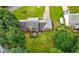 Aerial view showcasing the home's well-maintained lawn, patio area, driveway, and boat storage at 2868 Wood Park Nw Trce, Kennesaw, GA 30152