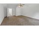 Spacious bedroom with a ceiling fan and neutral colored carpeting at 2868 Wood Park Nw Trce, Kennesaw, GA 30152
