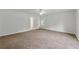 Spacious bedroom with neutral tones, plush carpeting, and a ceiling fan at 2868 Wood Park Nw Trce, Kennesaw, GA 30152