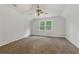 Bright bedroom with ceiling fan and window at 2868 Wood Park Nw Trce, Kennesaw, GA 30152