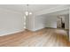 Spacious living room featuring hardwood floors, an open floor plan, and large windows at 2868 Wood Park Nw Trce, Kennesaw, GA 30152
