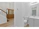 A charming powder room features modern vanity and mirror with beautiful wood door at 2868 Wood Park Nw Trce, Kennesaw, GA 30152