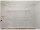 The walk-in storage room offers adjustable wire shelves and great space at 2868 Wood Park Nw Trce, Kennesaw, GA 30152
