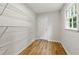 View of the large storage room with a window and wood laminate floors at 2868 Wood Park Nw Trce, Kennesaw, GA 30152
